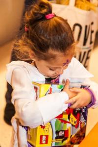 Little girl with a lego set